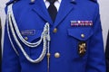 Upper part of Ukrainian police full dress: jacket, tie, chevron, epaulets, patch with name