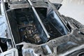 Upper rear view junkyard masterwork replica of Bugatti Chiron sport car made of scrap metal