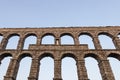 Upper side of roman aqueduct, with detail of Virgin of the Aqueduct, located in the central niche of the monument has since the