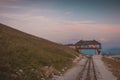 Upper terminus station of narrow cog railway on the schafberg mountain in upper austria. Romantic view of old train track high up