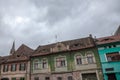 Upper town of Sibiu, in Transylvania, during a cloudy afternoon in a medieval street of the city.