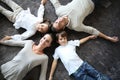 Upper view of family lying on the floor