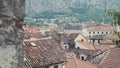 Upper View on Foofs of Old European Marine Town Near Sea Bay And Mountains