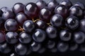Upper view of round gray grapes in gray background with co