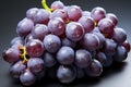 Upper view of round gray grapes in gray background with co