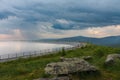 Upper water reservoir of the pumped storage hydro power plant Dlouhe Strane in Jeseniky Mountains, Czech Republic. Summer rainy Royalty Free Stock Photo
