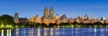 Upper West Side buildings at dawn and Central Park Reservoir. New York City Royalty Free Stock Photo