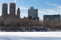 The Upper West Side Skyline seen from the Frozen Lake at Central Park with Snow in New York City Royalty Free Stock Photo