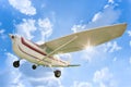 Upper wing aircraft on blue sky white clouds background