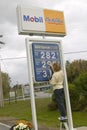 Upping the gas prices at a Mobil station in New Hampshire