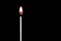 Upright Lit Match on a Black Background Royalty Free Stock Photo