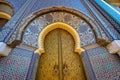 Upright view at the golden palace door with ornamental decorations in Fes, Morocco Royalty Free Stock Photo