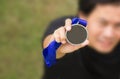 Uprisen Angle Of Asian Athlete Holding Generic Gold Medal With R Royalty Free Stock Photo