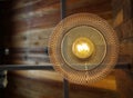 uprisen view of basketry weave design lamp thai style hanging from ceiling Royalty Free Stock Photo