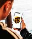 Ups on iphone in hand realistic texture Royalty Free Stock Photo