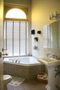 Upscale bathroom with corner tub. Royalty Free Stock Photo