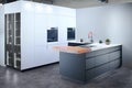 Upscale modern flat design loft kitchen with Induction cooker black glass hob with integrated hood or aspirating