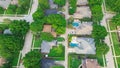 Upscale single-family homes with swimming pool and large backyard in expensive residential neighborhood suburbs Dallas, Texas, Royalty Free Stock Photo