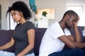 Upset African American couple ignore each other after quarrel Royalty Free Stock Photo