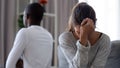 Upset African American couple ignoring each other after quarrel Royalty Free Stock Photo