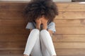 Sad biracial small girl sit on floor crying Royalty Free Stock Photo