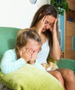 Upset baby-sitter and little girl Royalty Free Stock Photo