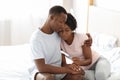 Upset black couple holding negative pregnancy test Royalty Free Stock Photo