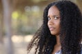 Upset black woman looking at camera in a park Royalty Free Stock Photo