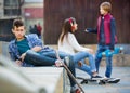 Upset boy and couple of teens apart Royalty Free Stock Photo