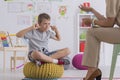 Upset boy covering ears Royalty Free Stock Photo