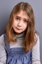 Upset brown hair little girl. Royalty Free Stock Photo