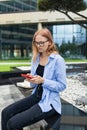 Angry business woman caucasian girl lady female student looking in mobile phone feels shock upset worries about bad news Royalty Free Stock Photo