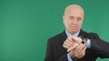 Upset Businessman Checking Hand Watch Waiting a Late Meeting Royalty Free Stock Photo