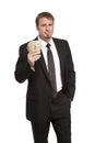 Upset businessman holds money