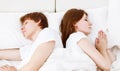 Upset couple having marital problems a disagreement and sleeping Royalty Free Stock Photo