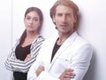 Upset couple leaning on a white wall Royalty Free Stock Photo