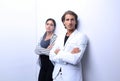 Upset couple leaning on a white wall Royalty Free Stock Photo