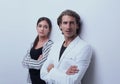 Upset couple leaning on a white wall Royalty Free Stock Photo