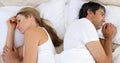 Upset couple sleeping separately Royalty Free Stock Photo