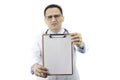 Upset doctor holding blank clipboard, copy space for text. Incidence statistics Royalty Free Stock Photo