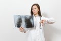 Upset doctor woman show thumb down with X-ray of lungs fluorography roentgen isolated on white background. Female doctor