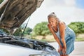 Upset driver woman in front of automobile broken car collision accident at city road Royalty Free Stock Photo