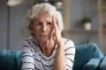 Upset elderly woman feel lonely suffer from depression