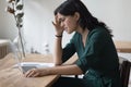 Upset entrepreneur woman facing problems with laptop, app wrong work