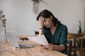 Upset exhausted freelance employee woman getting job report with mistake Royalty Free Stock Photo