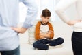 Upset or feeling guilty boy and parents at home Royalty Free Stock Photo