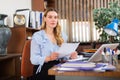 Upset female employee manager at working place Royalty Free Stock Photo