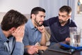 Upset friends talking on couch Royalty Free Stock Photo