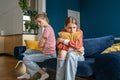 Upset frustrated mother and teenage daughter ignoring each other after quarrel at home, not talking Royalty Free Stock Photo