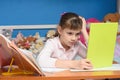 Upset girl dissatisfied with distance learning